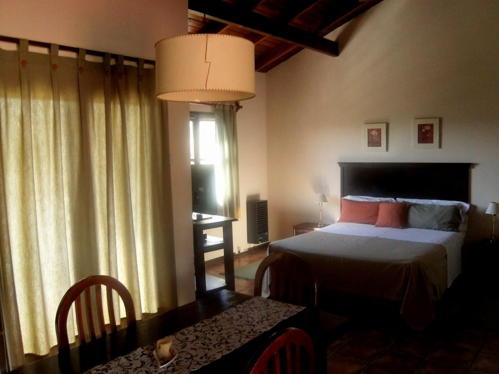 Las Ardillas Cabanas Y Suites La Falda Room photo